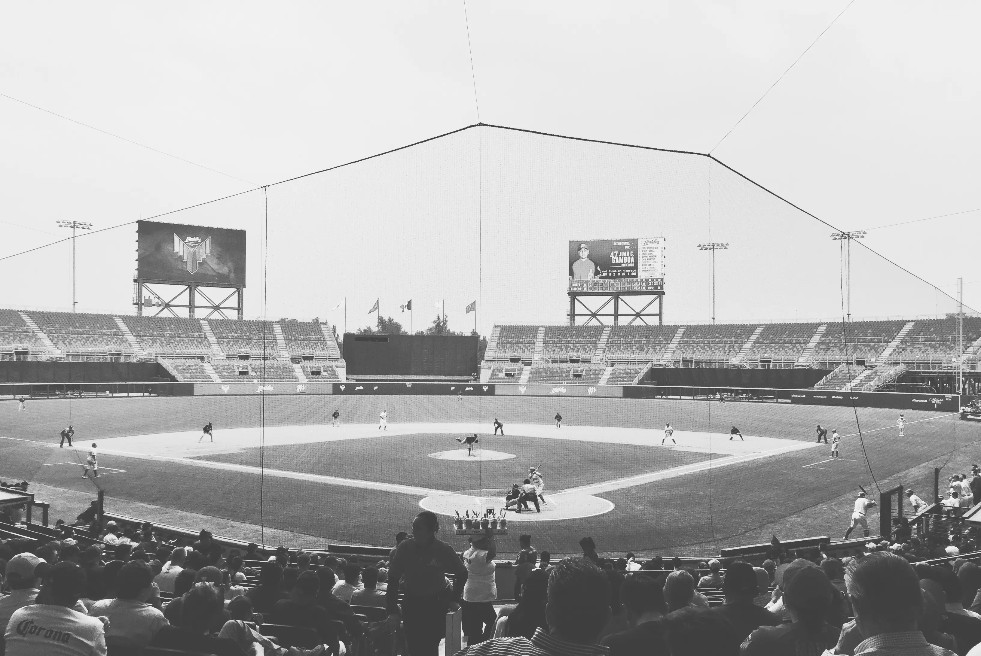 baseball players batting on a baseball field